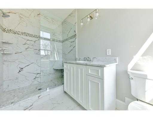 144 Schoolmasters Lane Dedham, MA 02026 - Photo 22 of 29 a bathroom with a sink and a mirror