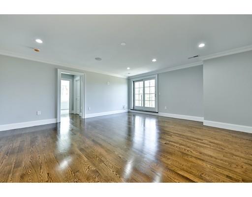 144 Schoolmasters Lane Dedham, MA 02026 - Photo 23 of 29 a view of an empty room with window and wooden floor