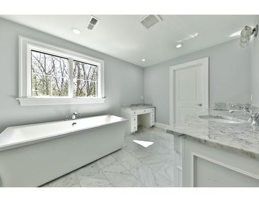 144 Schoolmasters Lane Dedham, MA 02026 - Photo 25 of 29 a bathroom with a granite countertop sink mirror and a bathtub