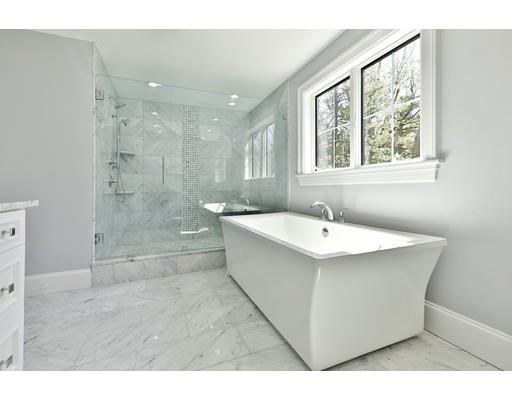 144 Schoolmasters Lane Dedham, MA 02026 - Photo 27 of 29 a bathroom with a sink a toilet and shower