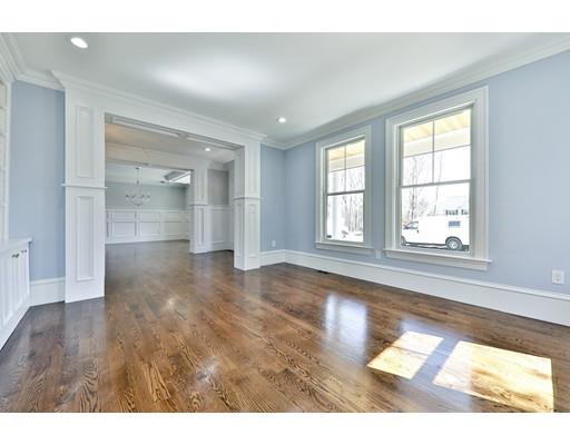 144 Schoolmasters Lane Dedham, MA 02026 - Photo 7 of 29 a view of empty room with wooden floor and fan
