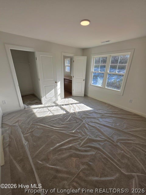 142 Carver Street Carthage, NC 28327 - Photo 21 of 40 a view of an empty room with window and wooden floor