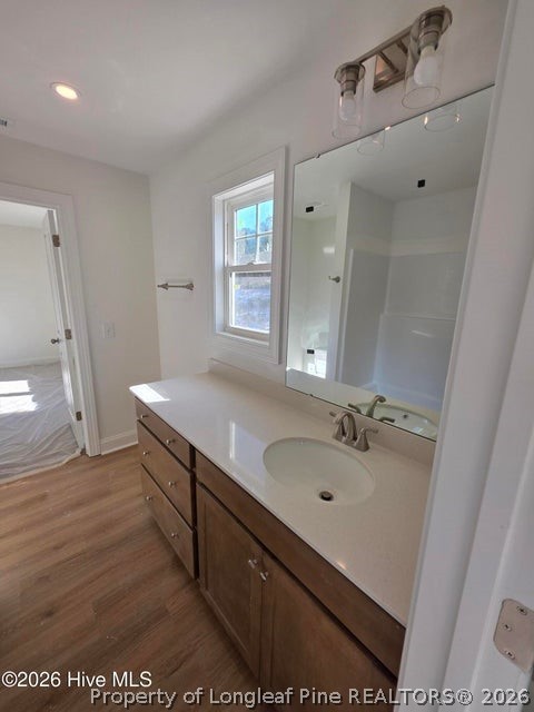 142 Carver Street Carthage, NC 28327 - Photo 25 of 40 a bathroom with a sink a vanity and a mirror