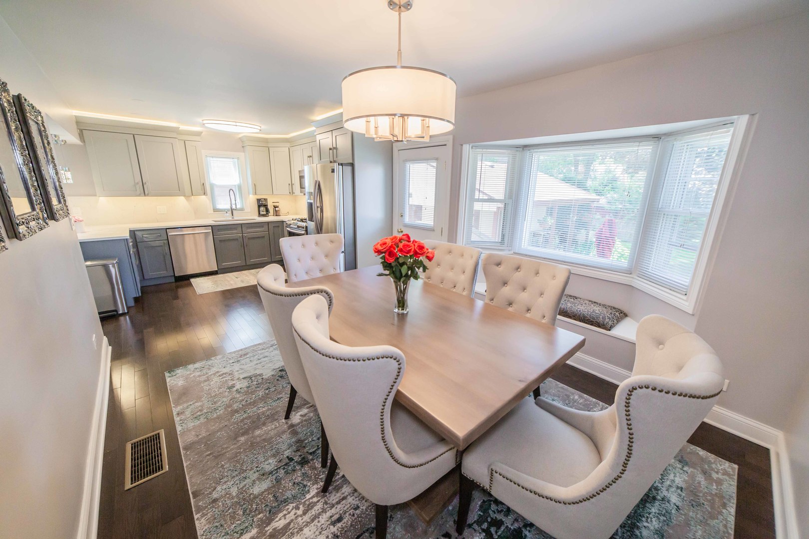 1924 Linden Avenue Park Ridge, IL 60068 - Photo 14 of 28 a view of a dining room with furniture wooden floor and chandelier