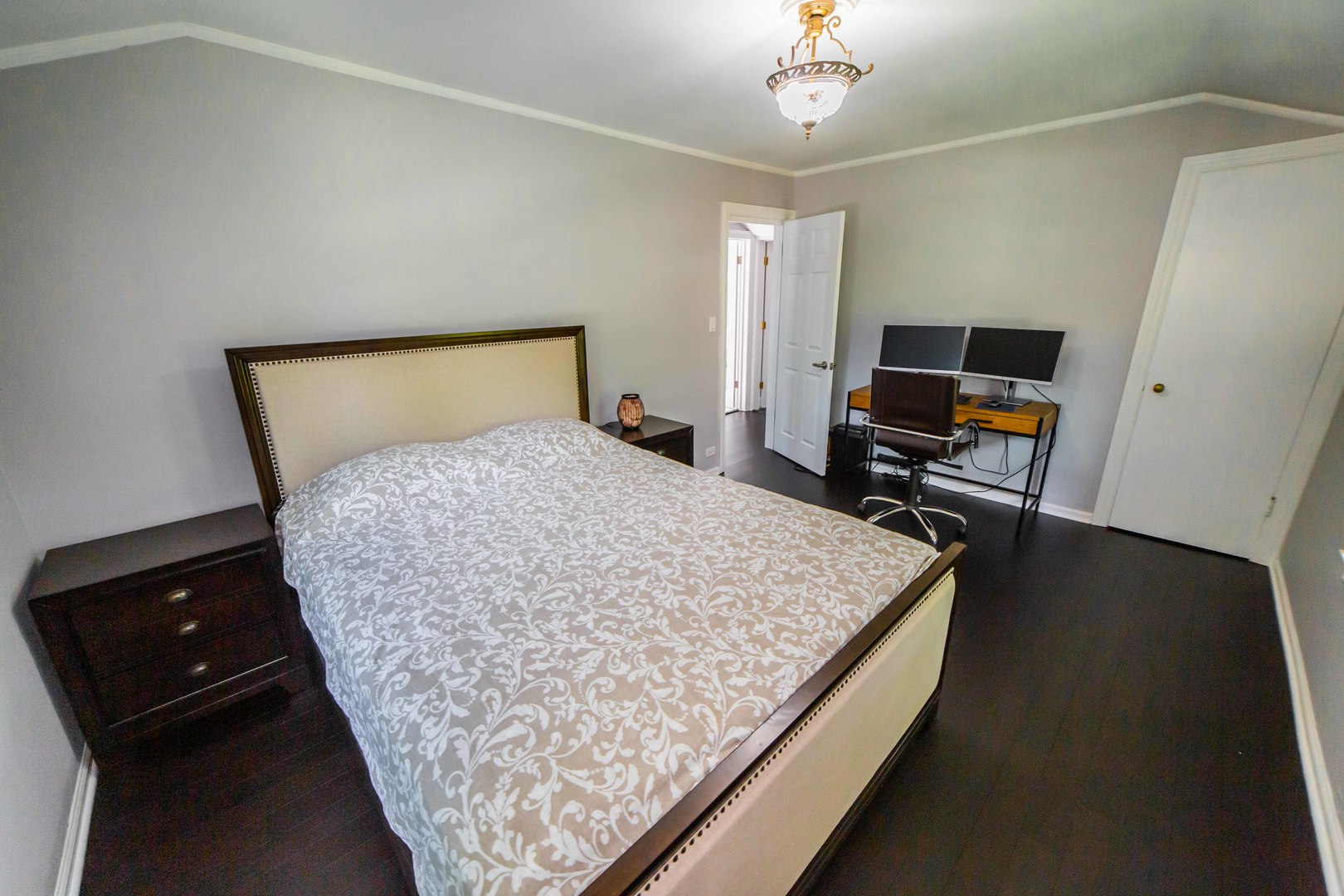 1924 Linden Avenue Park Ridge, IL 60068 - Photo 20 of 28 a bed sitting in a bedroom next to a window with pc on table