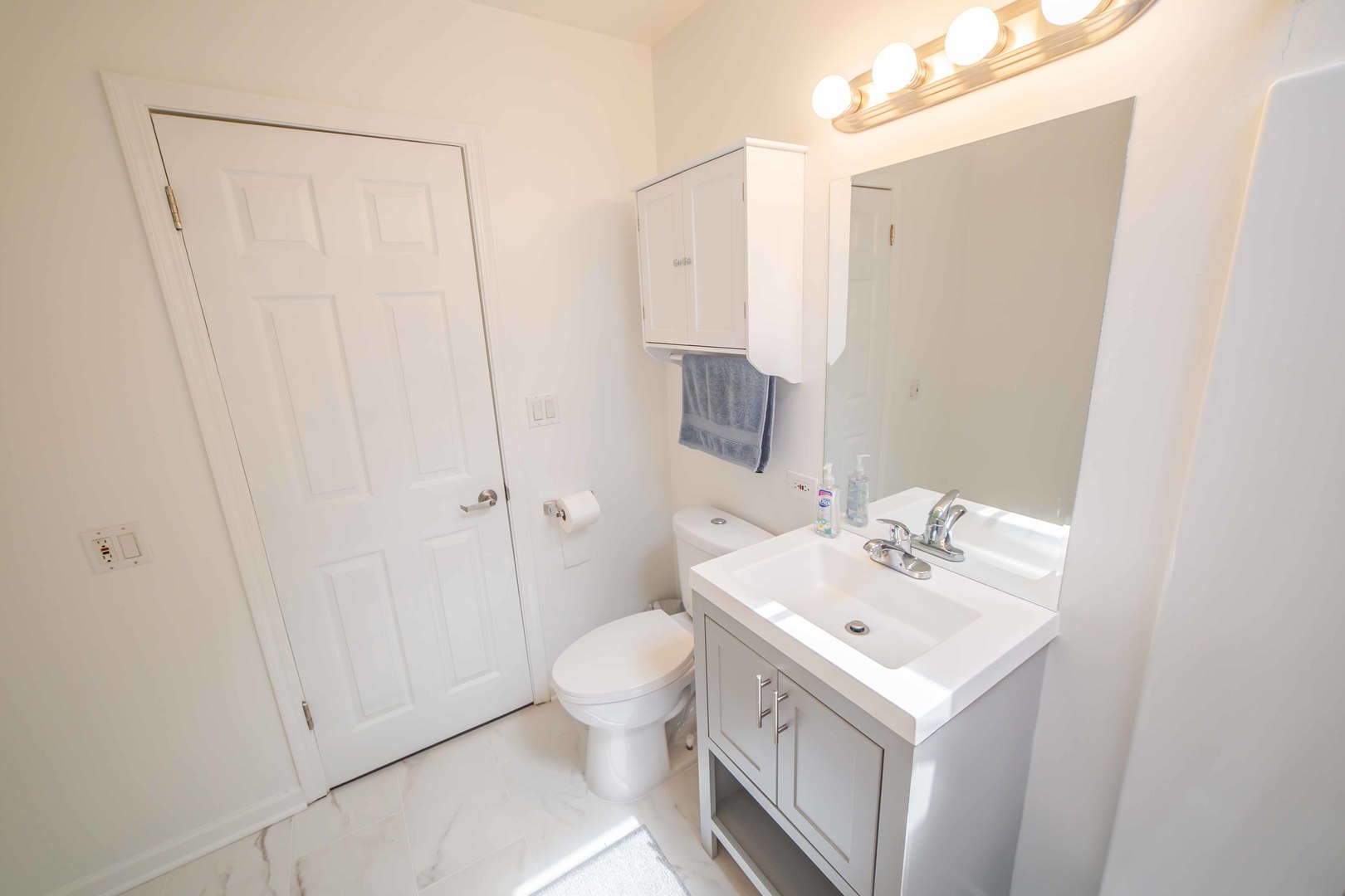 1924 Linden Avenue Park Ridge, IL 60068 - Photo 22 of 28 a bathroom with a sink a toilet and shower