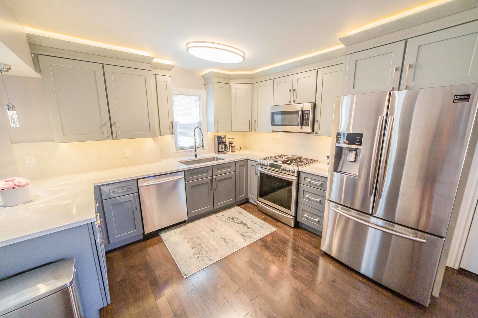 1924 Linden Avenue Park Ridge, IL 60068 - Photo 5 of 28 a kitchen with a refrigerator sink and wooden floor