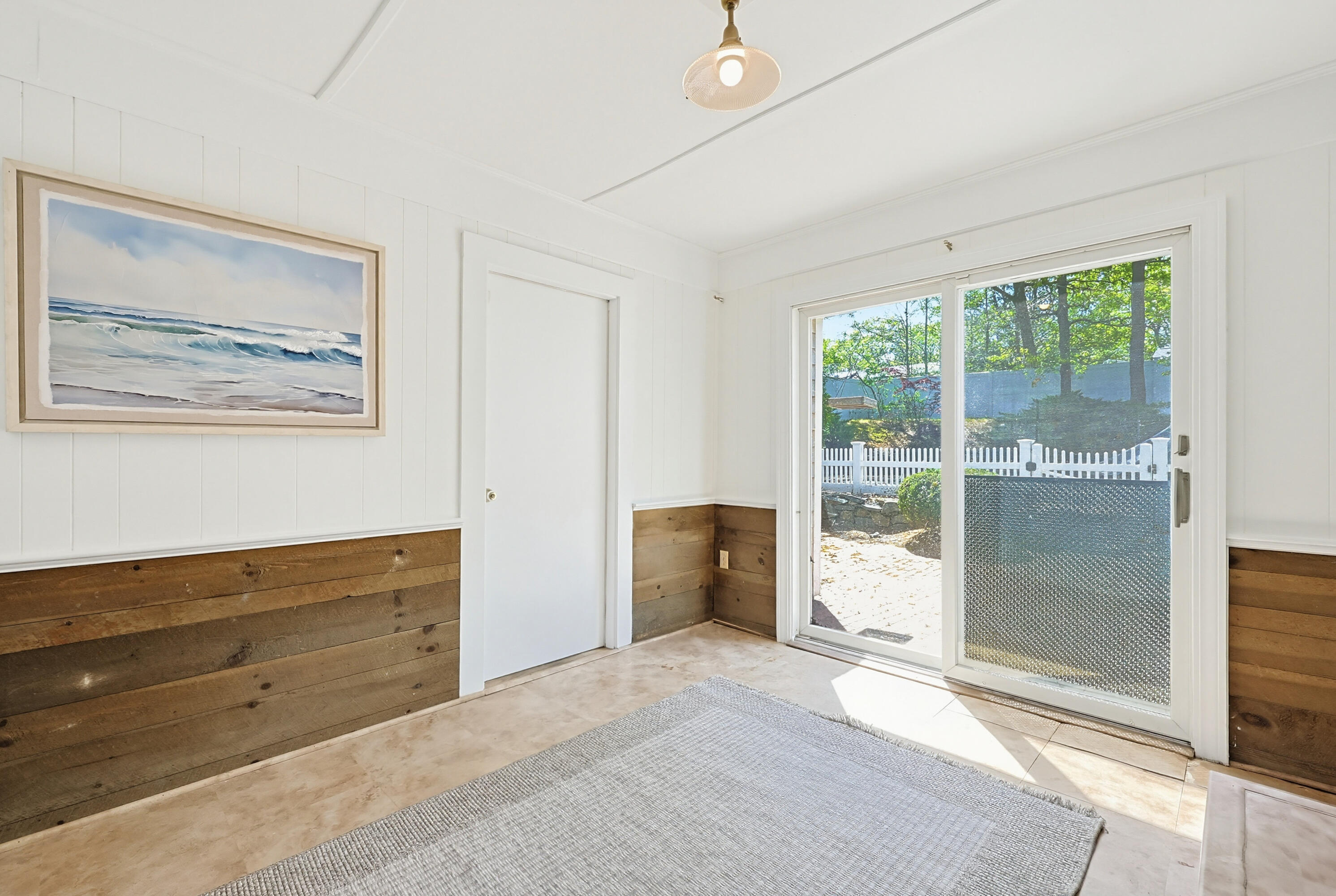 556 Cotuit Road Mashpee, MA 02649 - Photo 19 of 45 a room with a bed and a television