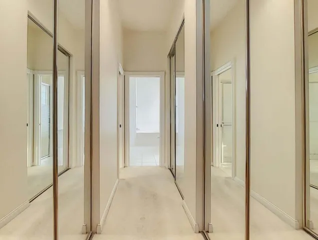 a bedroom with a bed and a cabinets