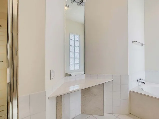 an aerial view of residential houses with outdoor space and river