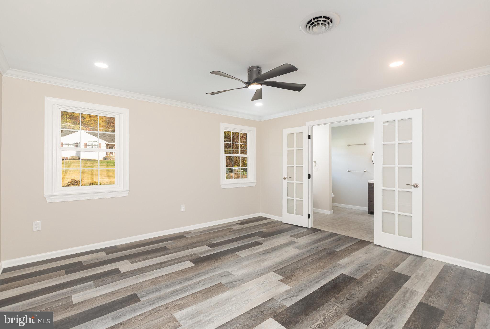 481 Sample Bridge Road Enola, PA 17025 - Photo 22 of 55 a view of empty room with wooden floor and ceiling fan