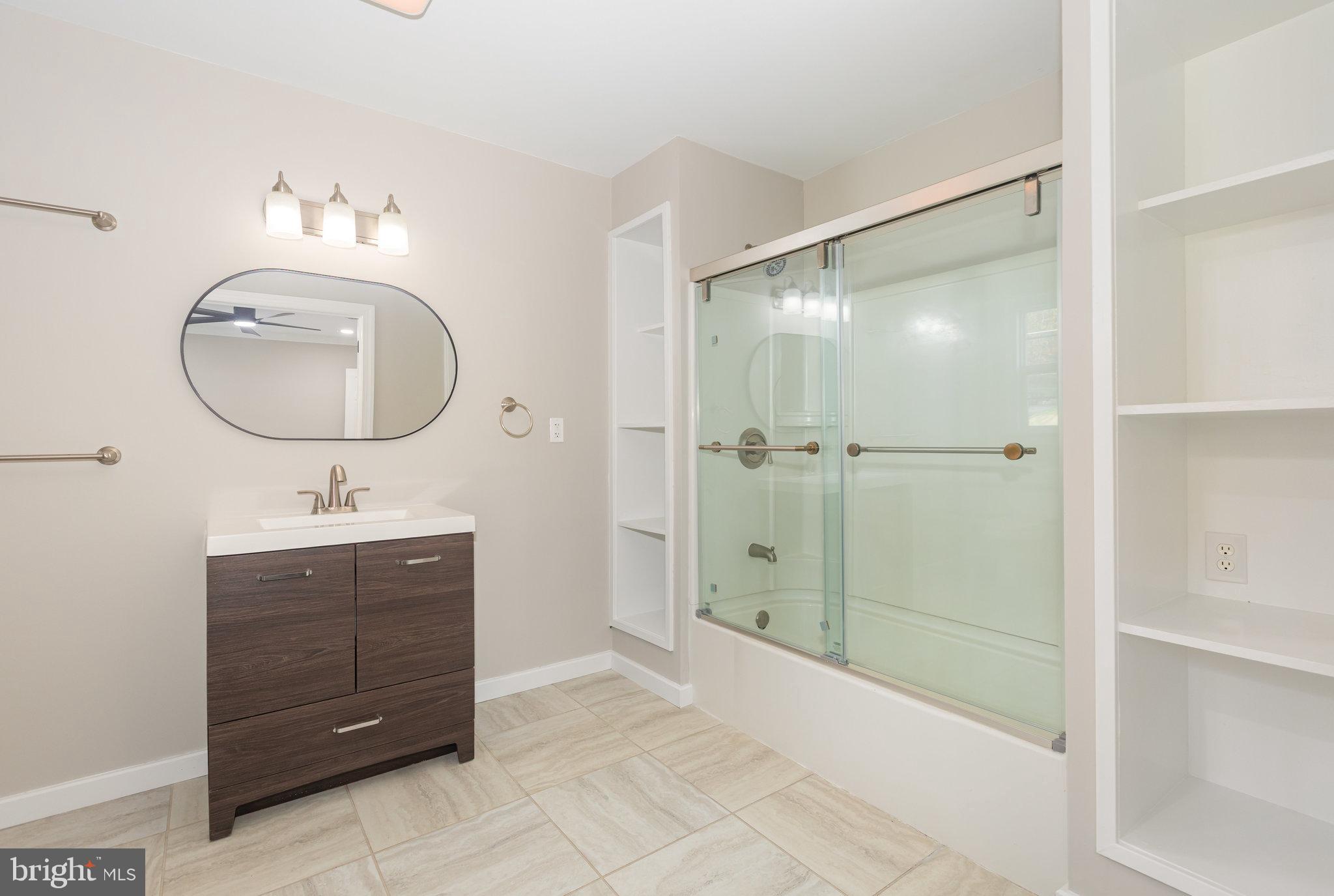 481 Sample Bridge Road Enola, PA 17025 - Photo 24 of 55 a bathroom with a sink a light fixture and a mirror