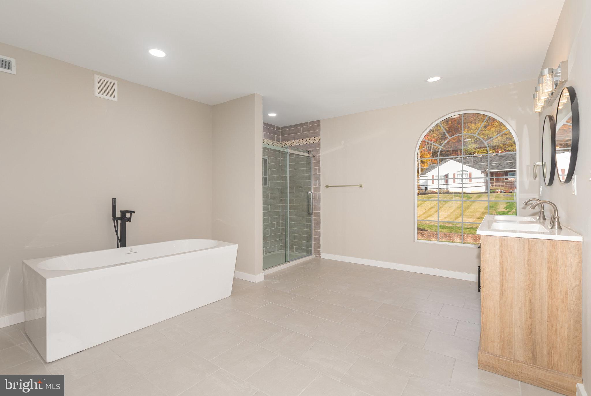 481 Sample Bridge Road Enola, PA 17025 - Photo 33 of 55 a view of an empty room with window and mirror