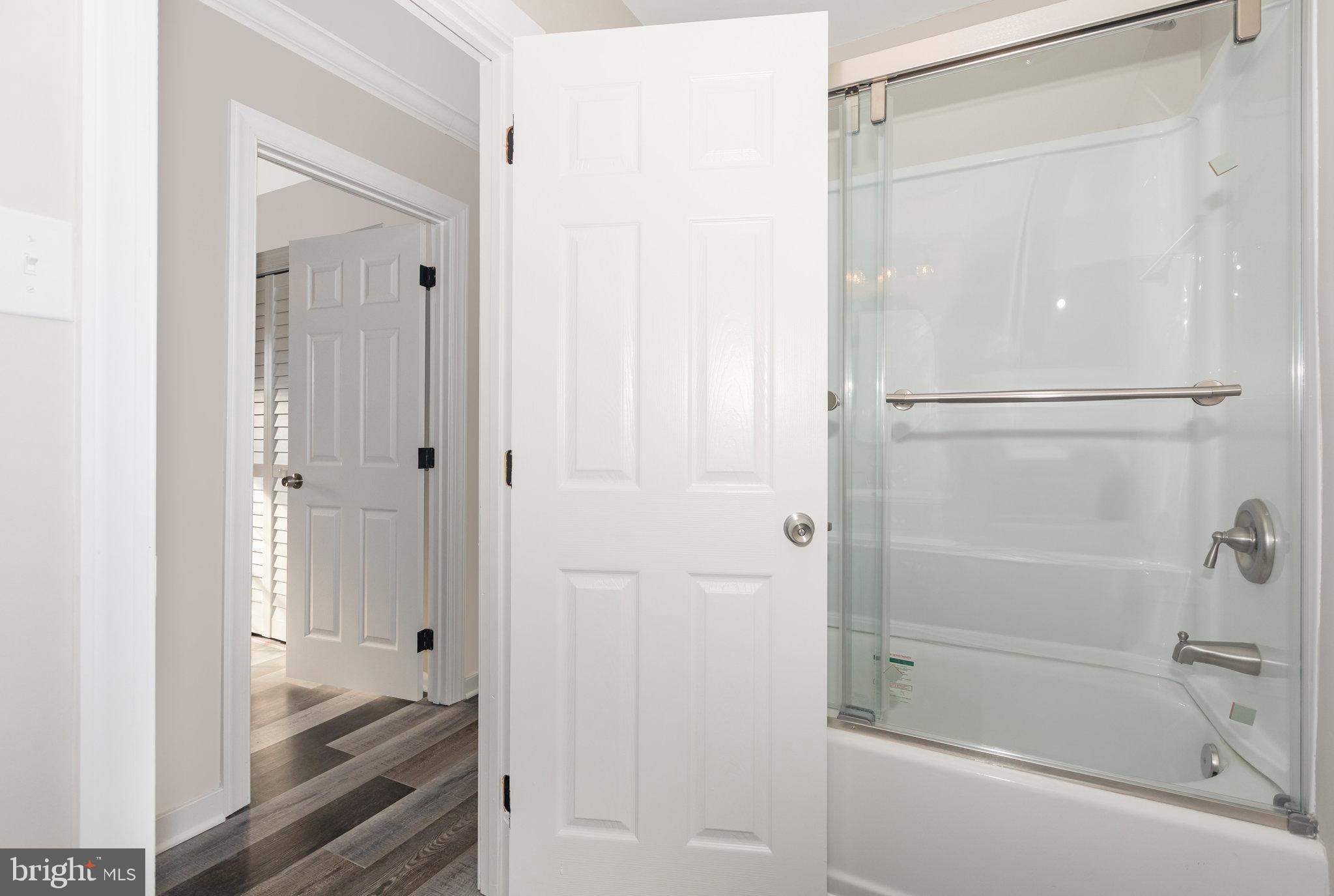 481 Sample Bridge Road Enola, PA 17025 - Photo 42 of 55 a bathroom with a bathtub and a shower