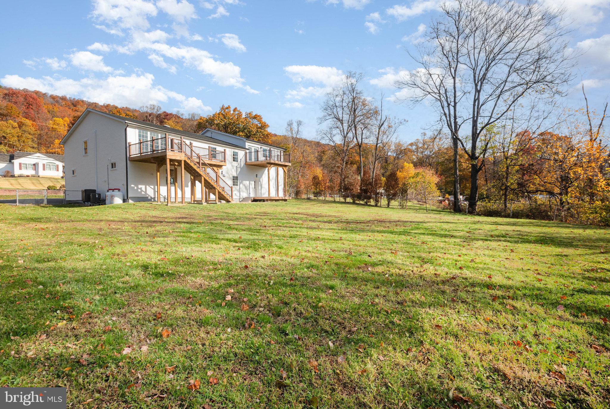 481 Sample Bridge Road Enola, PA 17025 - Photo 44 of 55 a view of a big room with a big yard and large trees