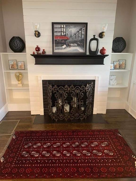 a picture of a rug and front door of the house