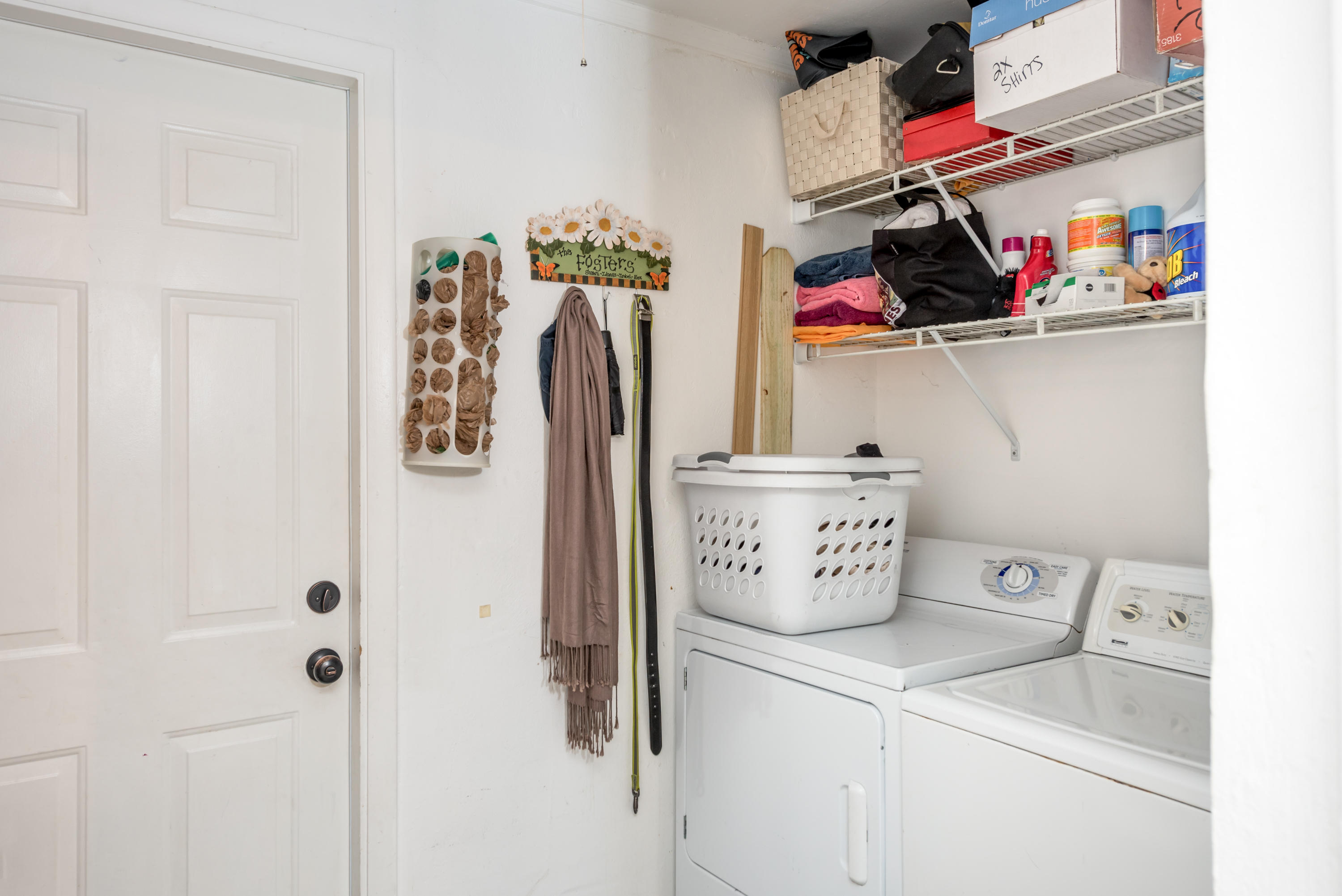 455 Northeast 37th Street Boca Raton, FL 33431 - Photo 14 of 19 a view of walk in closet with clothes and shoes