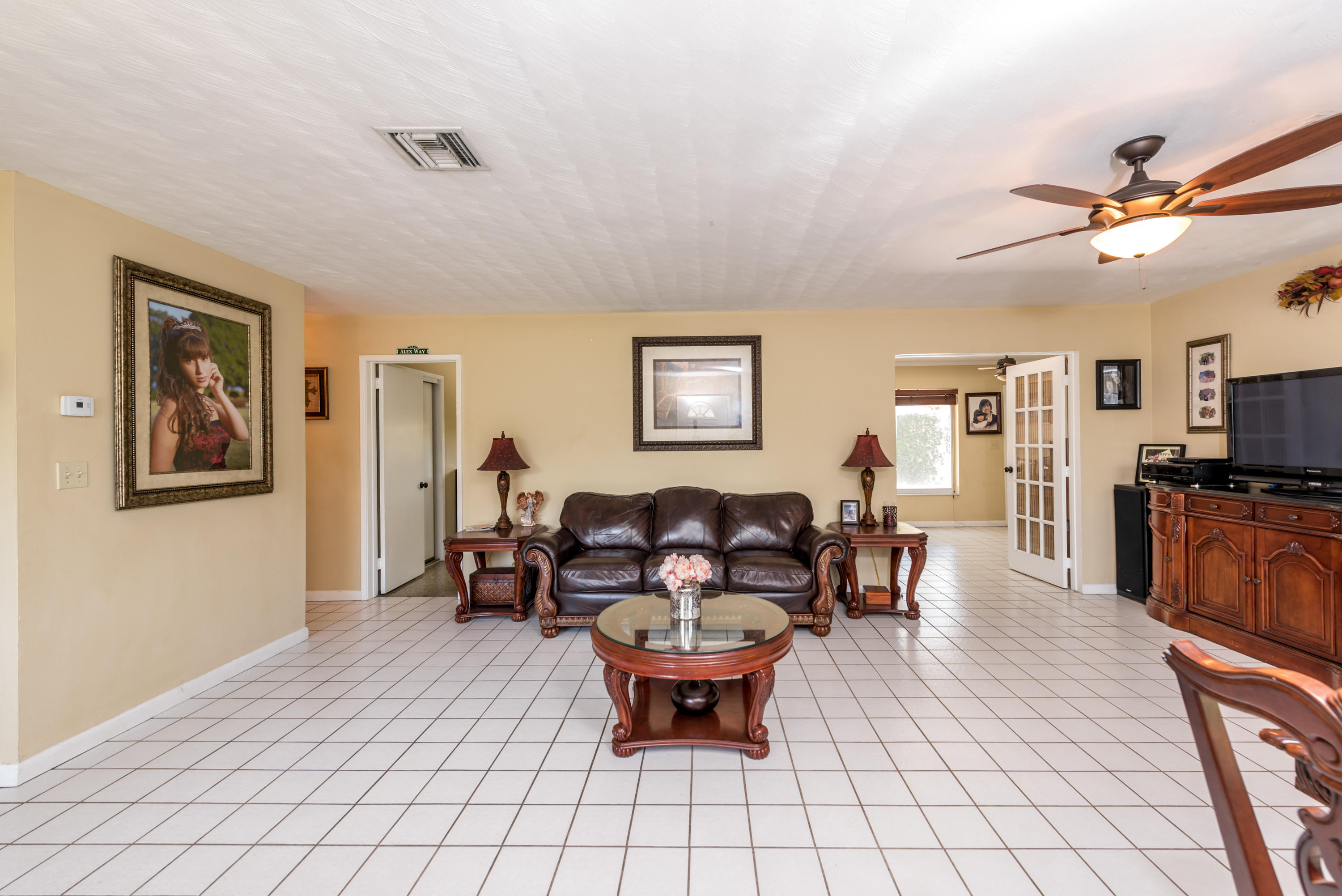 455 Northeast 37th Street Boca Raton, FL 33431 - Photo 2 of 19 a living room with furniture and wooden floor