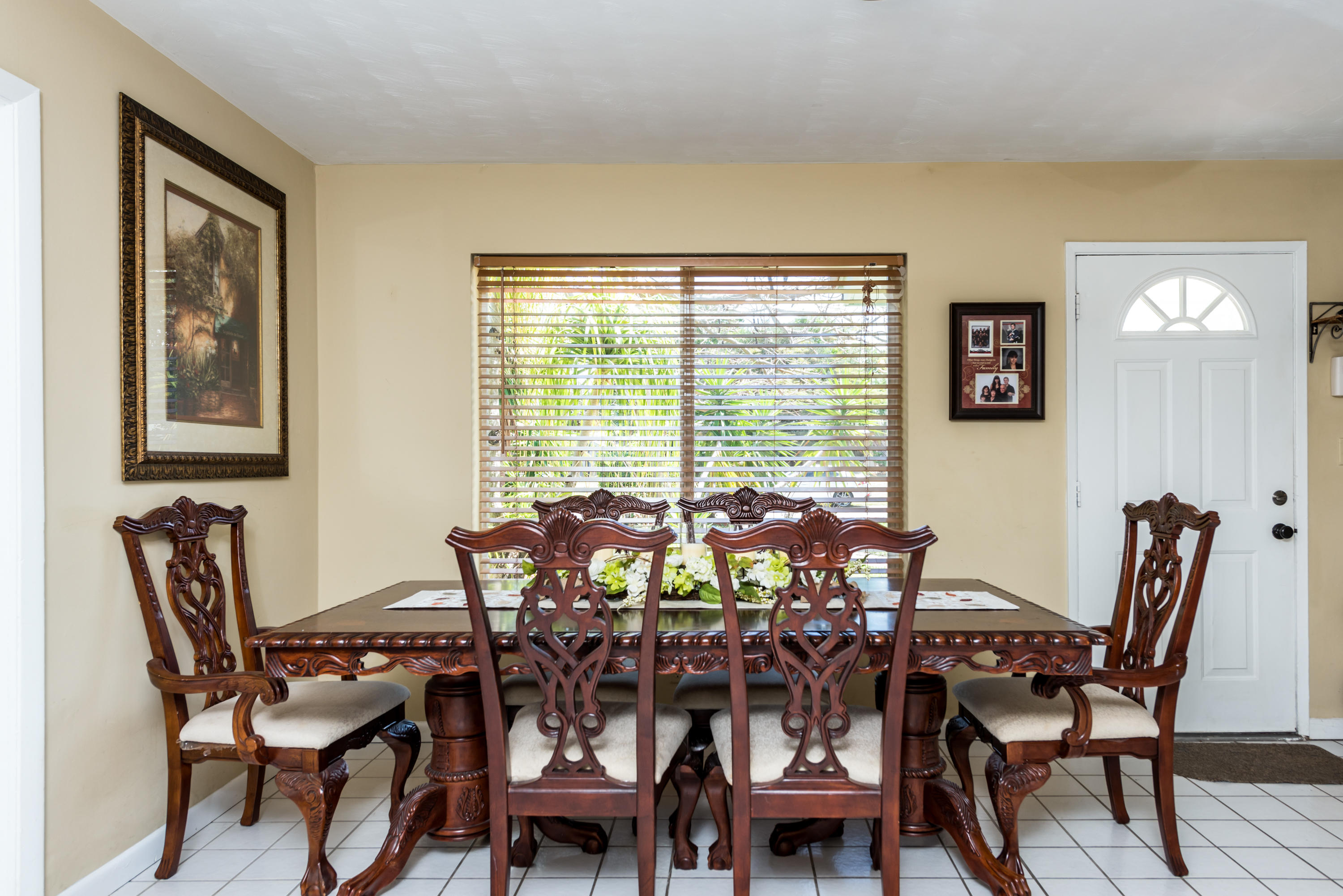 455 Northeast 37th Street Boca Raton, FL 33431 - Photo 4 of 19 a view of a dining room with furniture and window