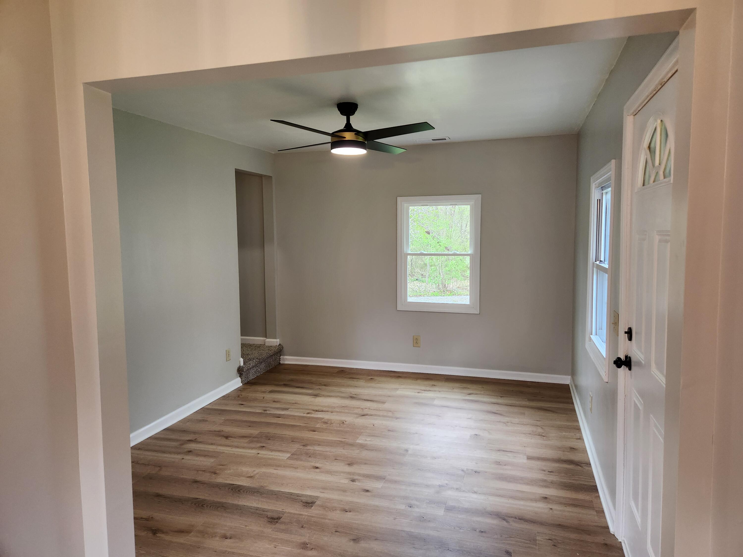 101 Union Road Ferrum, VA 24088 - Photo 16 of 41 wooden floor in an empty room with a window