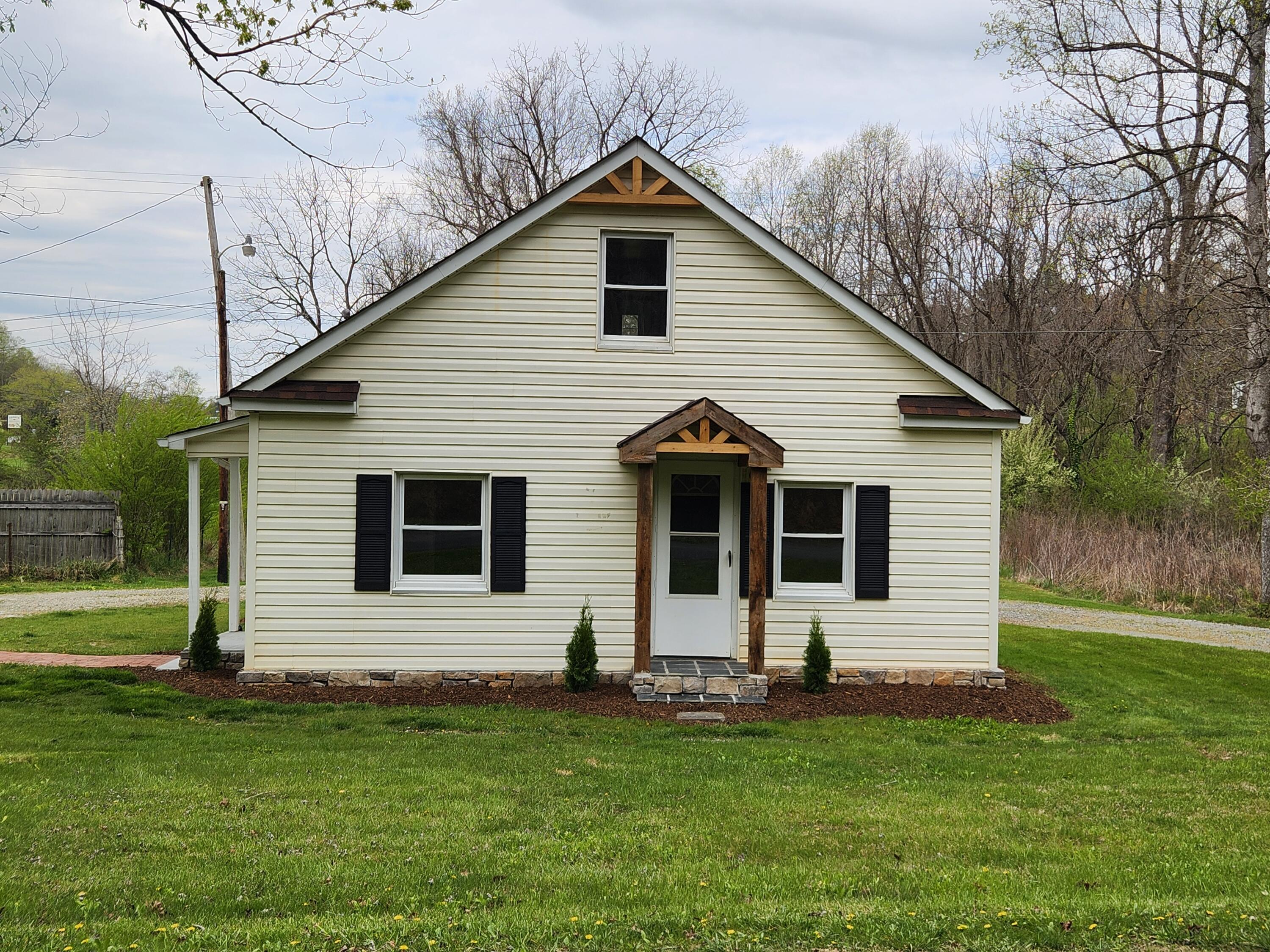 101 Union Road Ferrum, VA 24088 - Photo 2 of 41 a front view of house with yard and green space