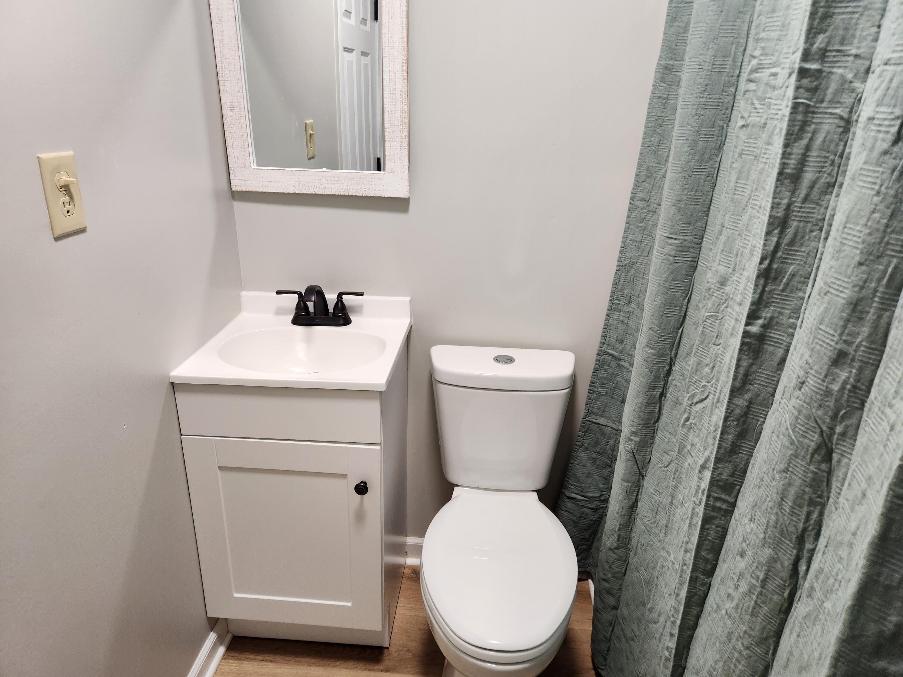 101 Union Road Ferrum, VA 24088 - Photo 24 of 41 a white toilet sitting next to a white sink