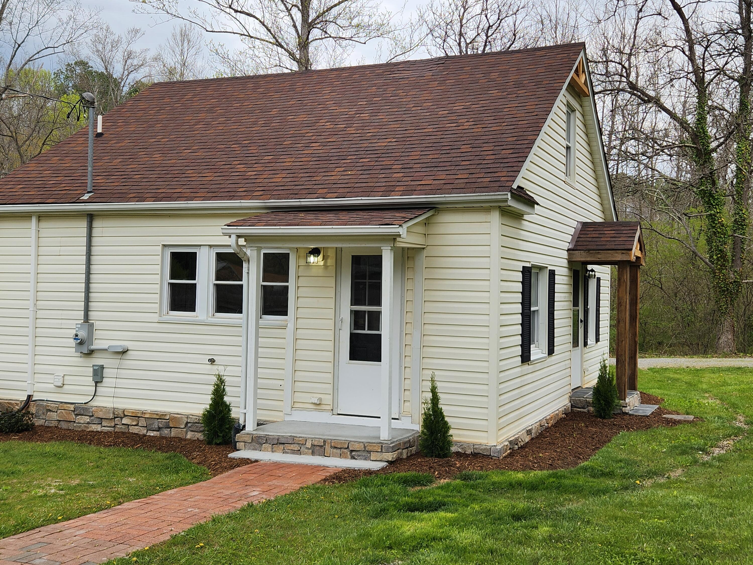 101 Union Road Ferrum, VA 24088 - Photo 3 of 41 a front view of a house with a yard