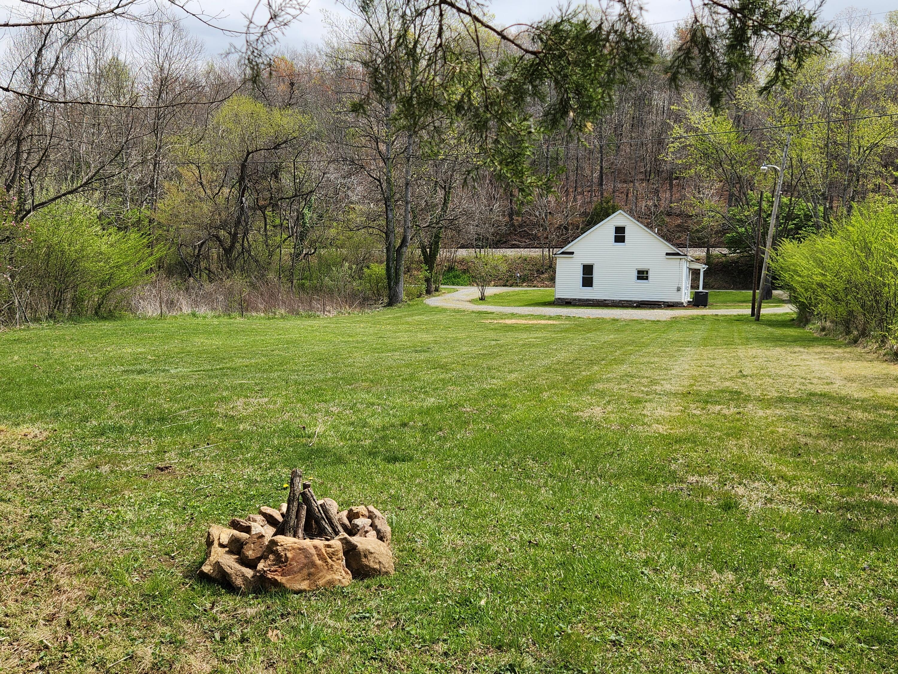 101 Union Road Ferrum, VA 24088 - Photo 35 of 41 a view of a wooden house and a yard