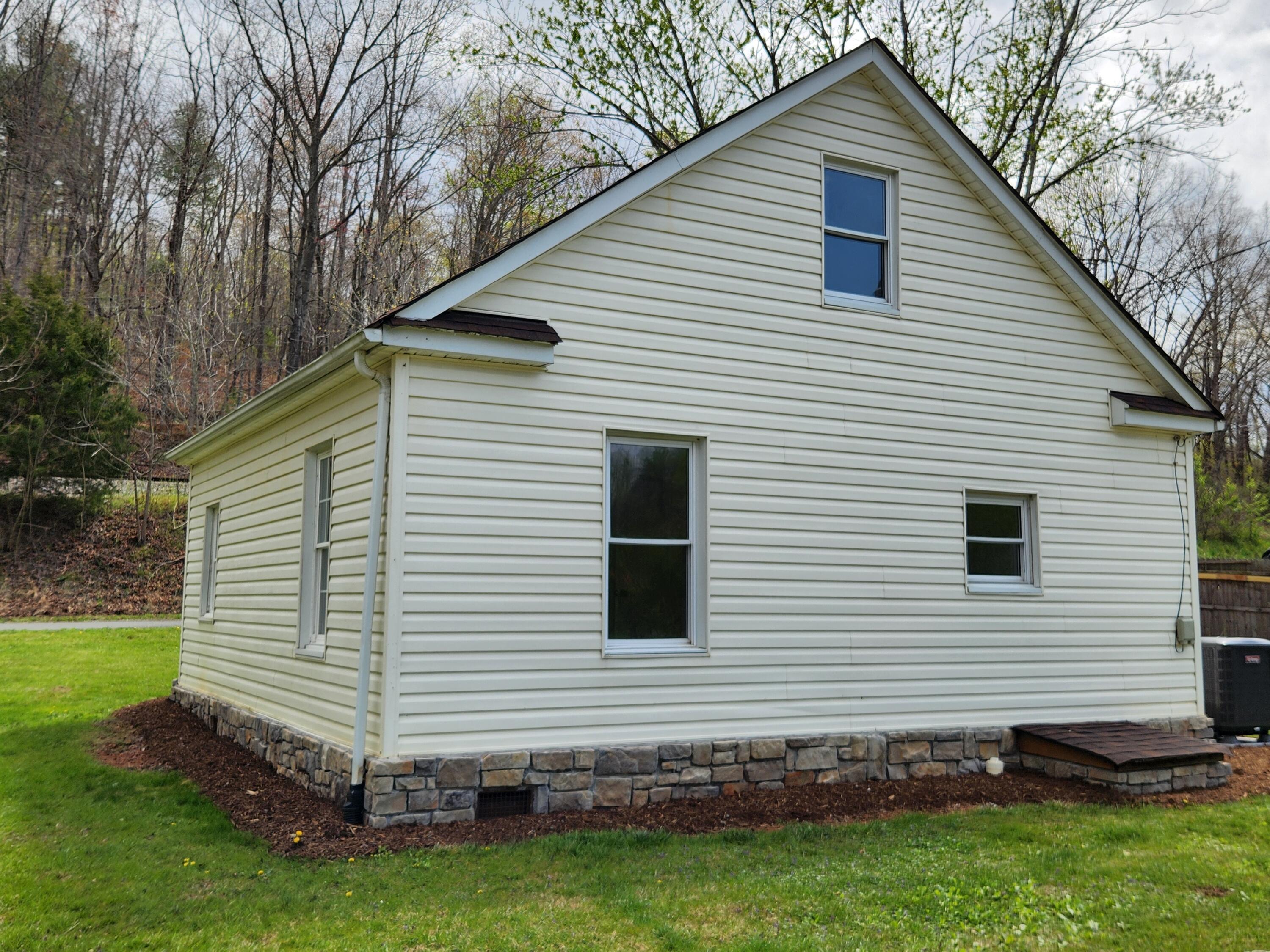 101 Union Road Ferrum, VA 24088 - Photo 4 of 41 a view of a house with a yard