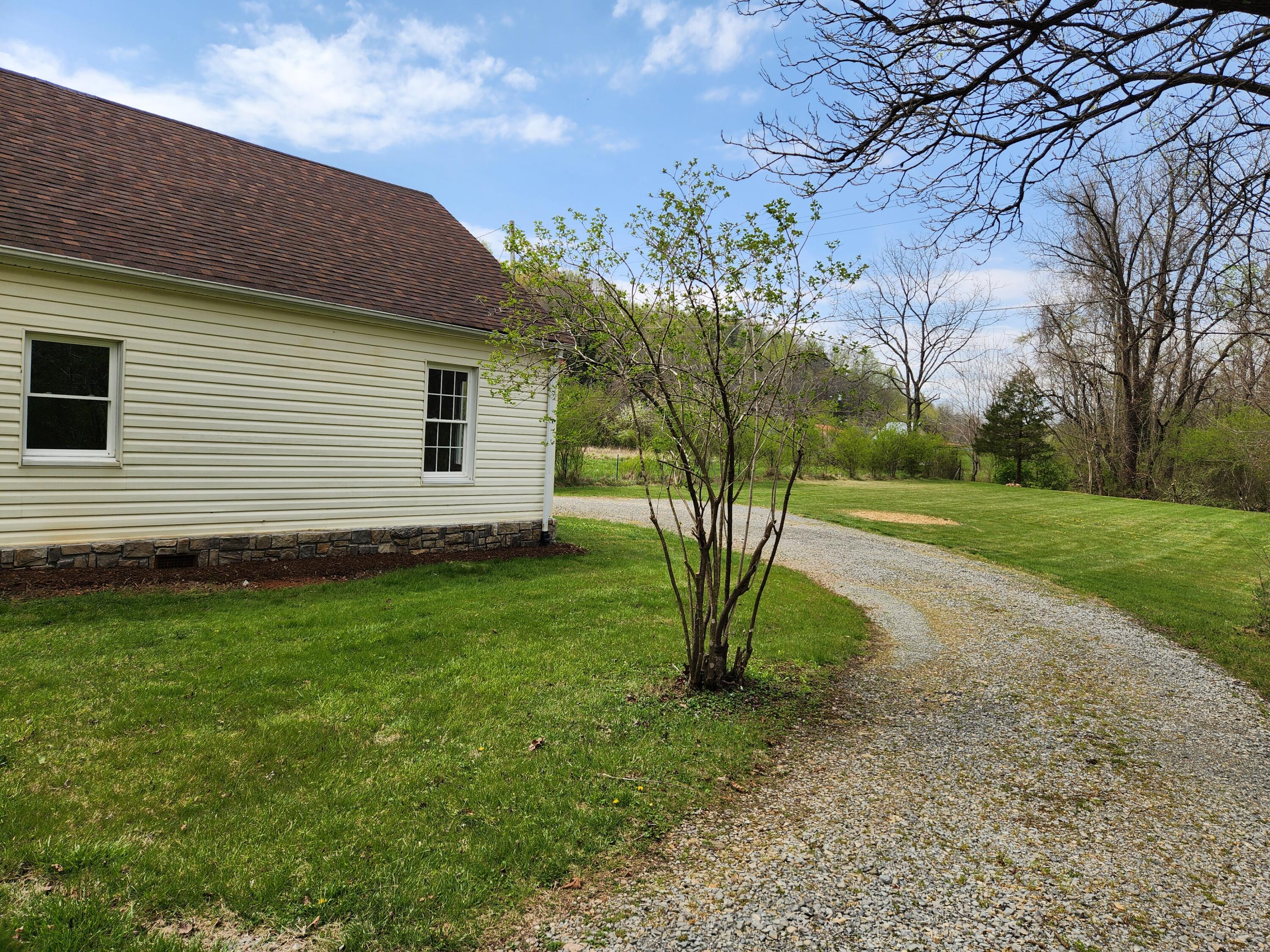 101 Union Road Ferrum, VA 24088 - Photo 6 of 41 a view of a house with a backyard