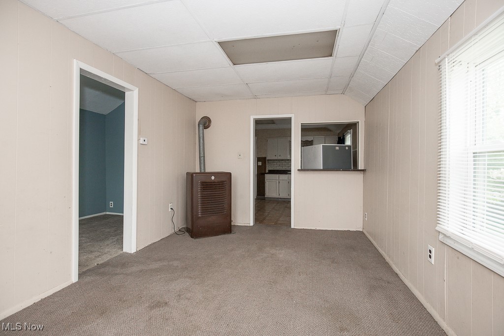 5008 Dolloff Road Cleveland, OH 44127 - Photo 3 of 16 Unfurnished room featuring carpet floors