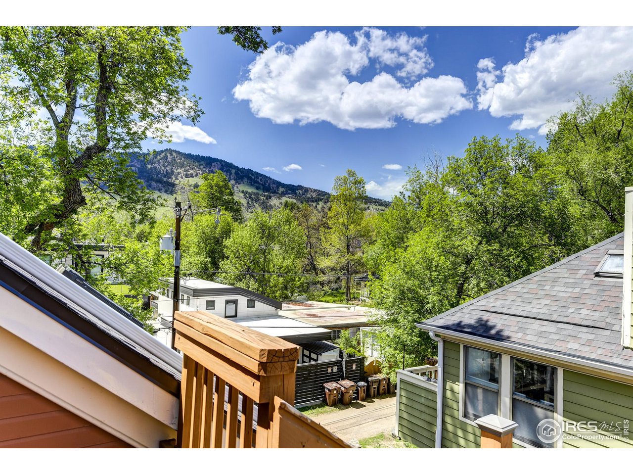 3025 Broadway, Unit 10 Boulder, CO 80304 - Photo 6 of 20 a terrace with outdoor seating and city view