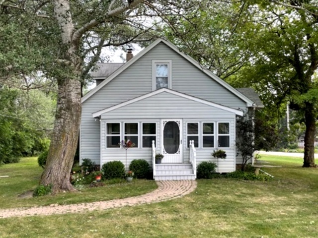 8808 Bard Road Crystal Lake, IL 60014 - Photo 14 of 32 a view of a house with a yard and sitting area