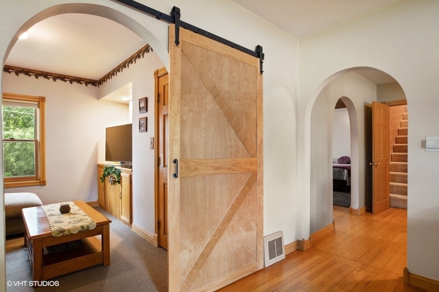 8808 Bard Road Crystal Lake, IL 60014 - Photo 17 of 32 a living room with furniture and a window