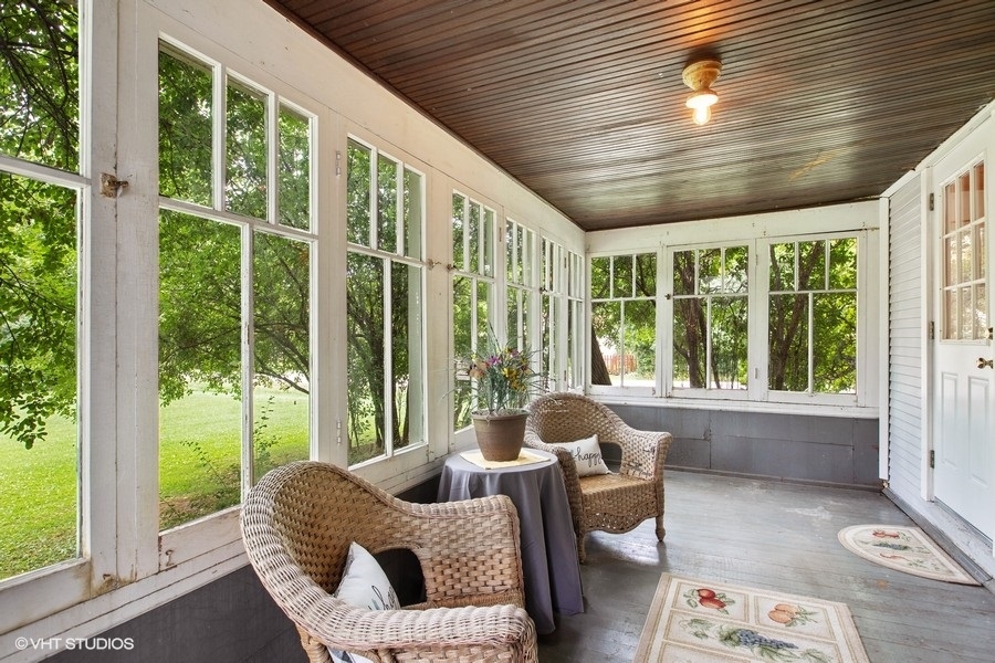 8808 Bard Road Crystal Lake, IL 60014 - Photo 22 of 32 a living room with furniture and large windows