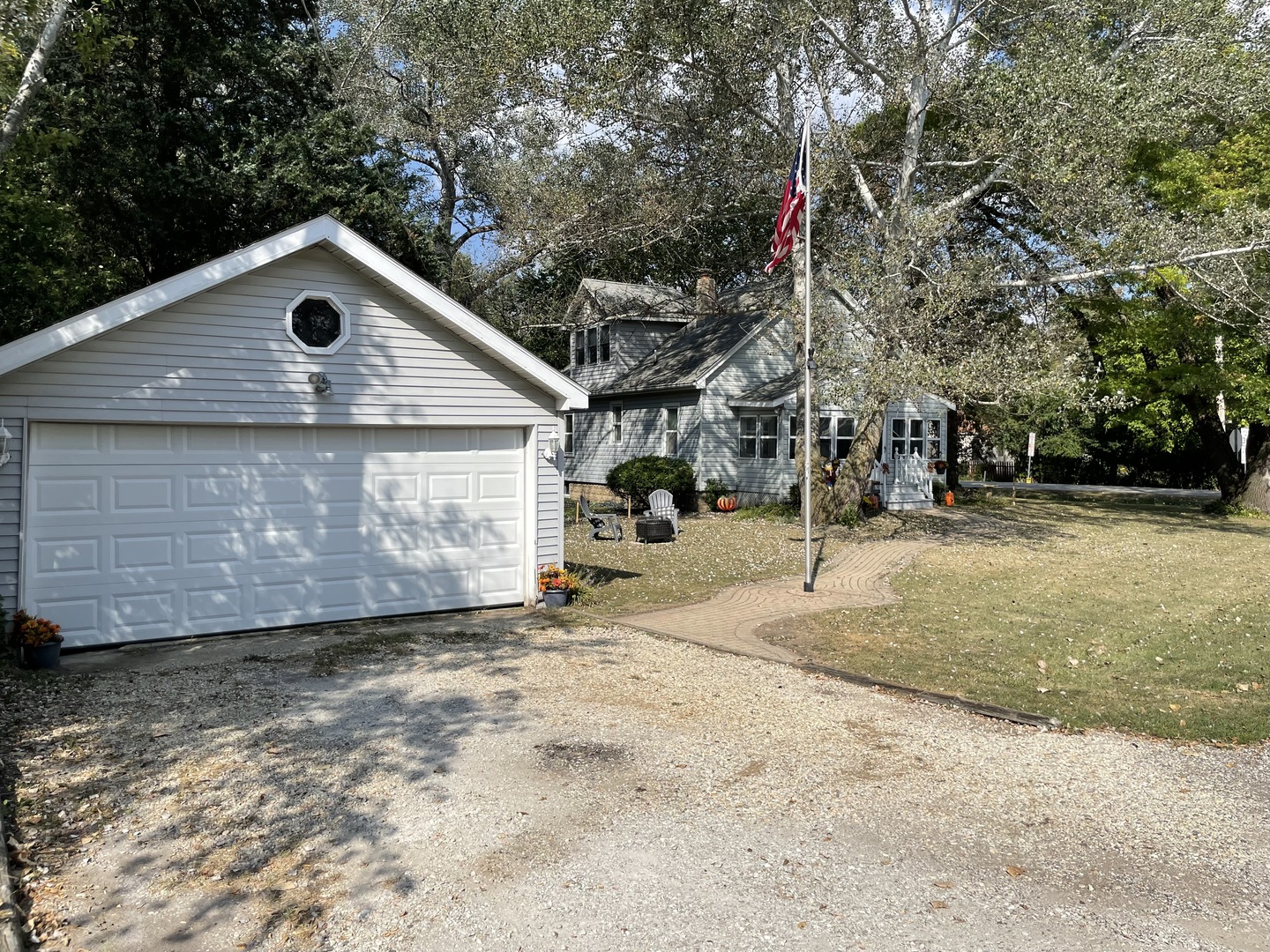 8808 Bard Road Crystal Lake, IL 60014 - Photo 26 of 32 a front view of a house with a yard