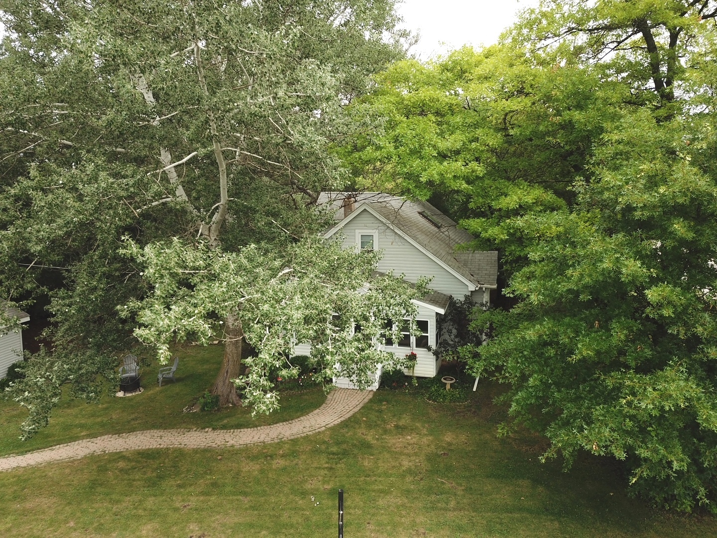 8808 Bard Road Crystal Lake, IL 60014 - Photo 29 of 32 a view of a house with a yard