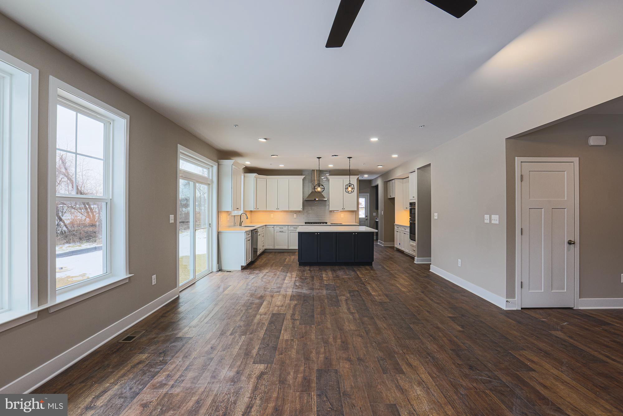 4712 Carroll Manor Road Baldwin, MD 21013 - Photo 16 of 69 a view of a kitchen with wooden floor and windows