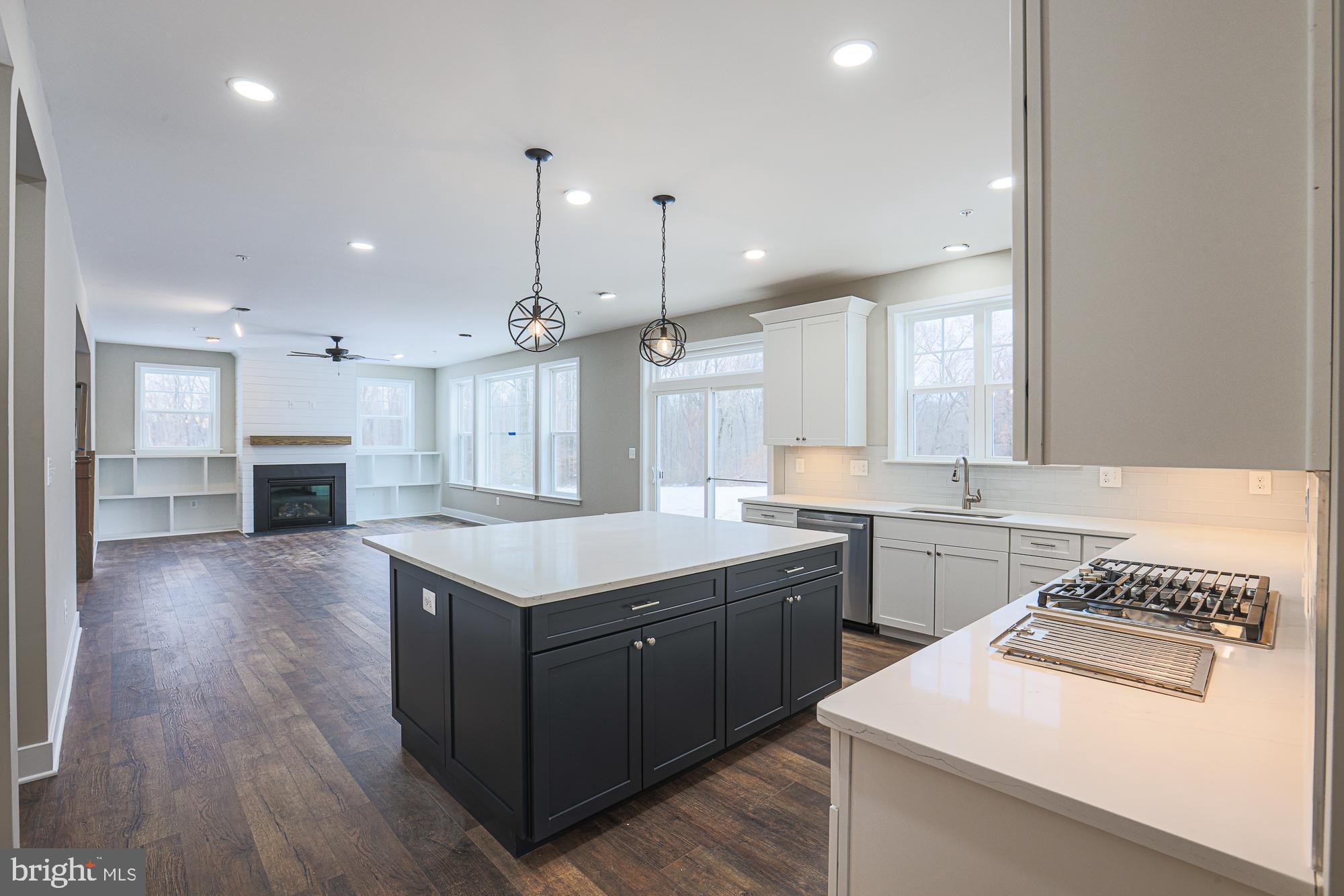 4712 Carroll Manor Road Baldwin, MD 21013 - Photo 26 of 69 a kitchen with a stove sink and a refrigerator