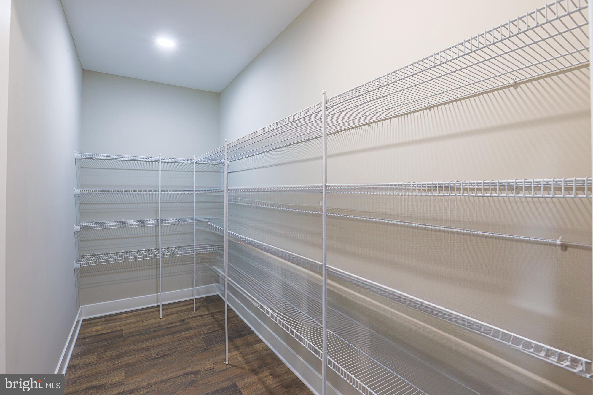 4712 Carroll Manor Road Baldwin, MD 21013 - Photo 28 of 69 a view of a room with wooden floor and cabinet