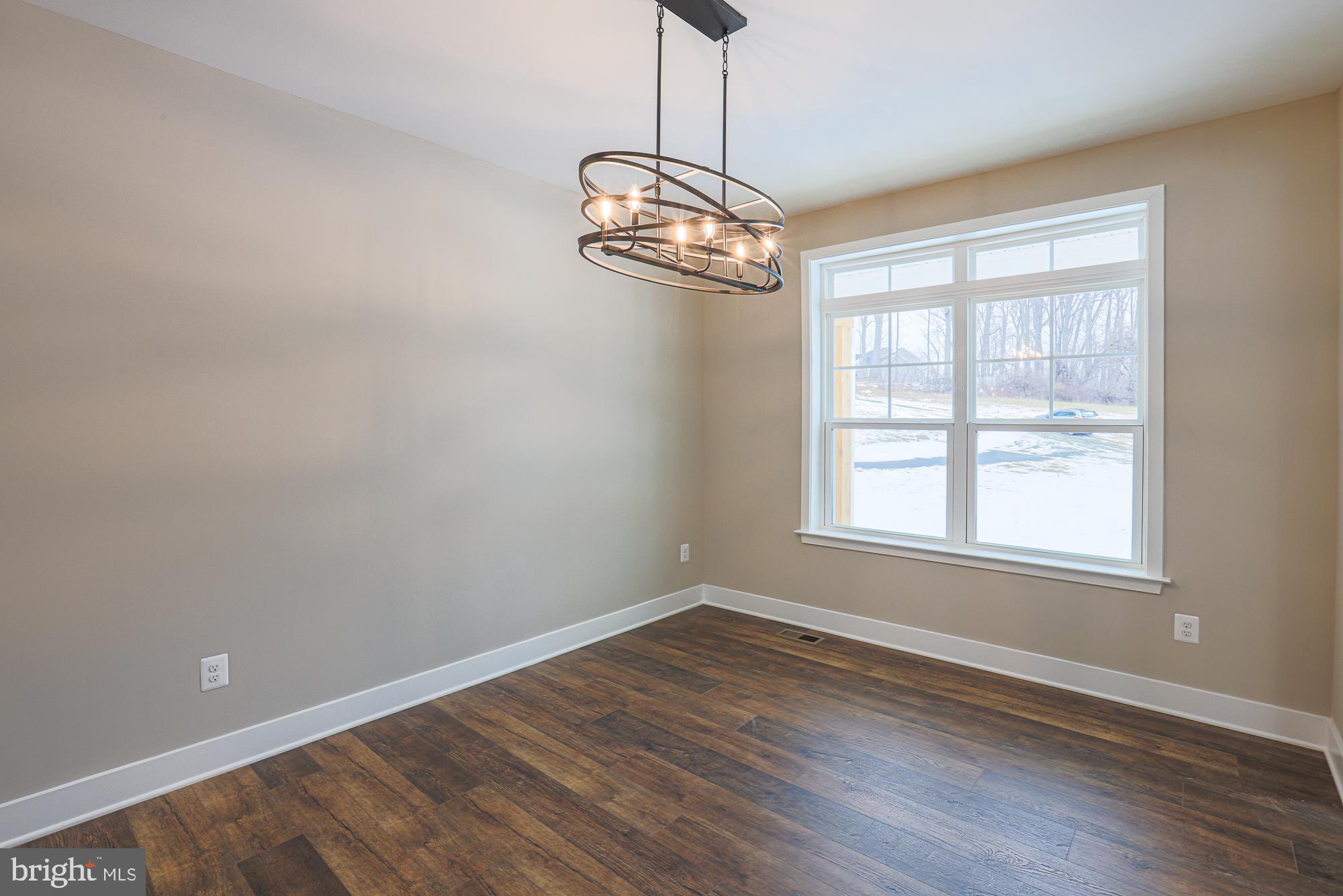 4712 Carroll Manor Road Baldwin, MD 21013 - Photo 8 of 69 wooden floor in an empty room with a window