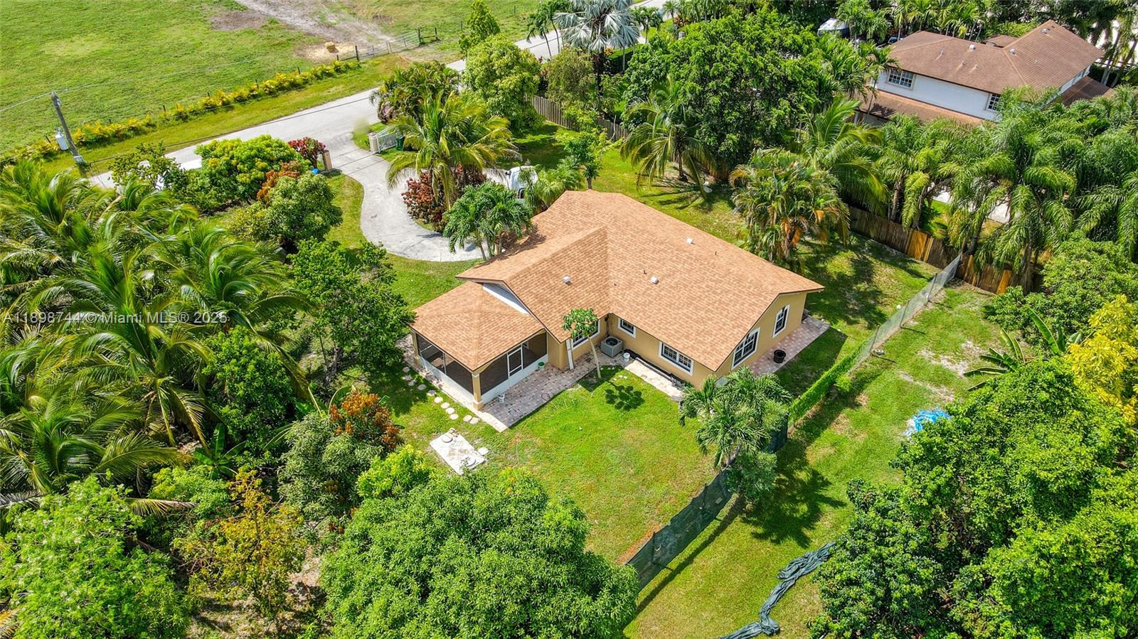 5130 Southwest 208th Lane Southwest Ranches, FL 33332 - Photo 1 of 53 an aerial view of a house with a garden