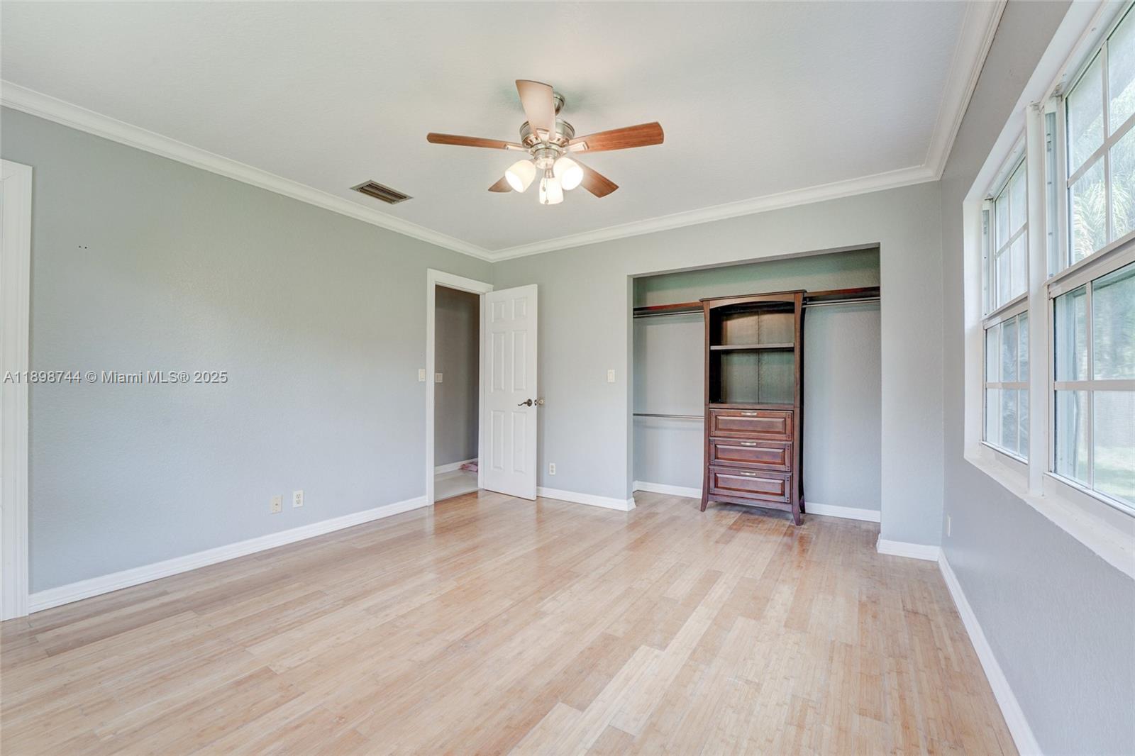 5130 Southwest 208th Lane Southwest Ranches, FL 33332 - Photo 27 of 53 wooden floor in an empty room with a window