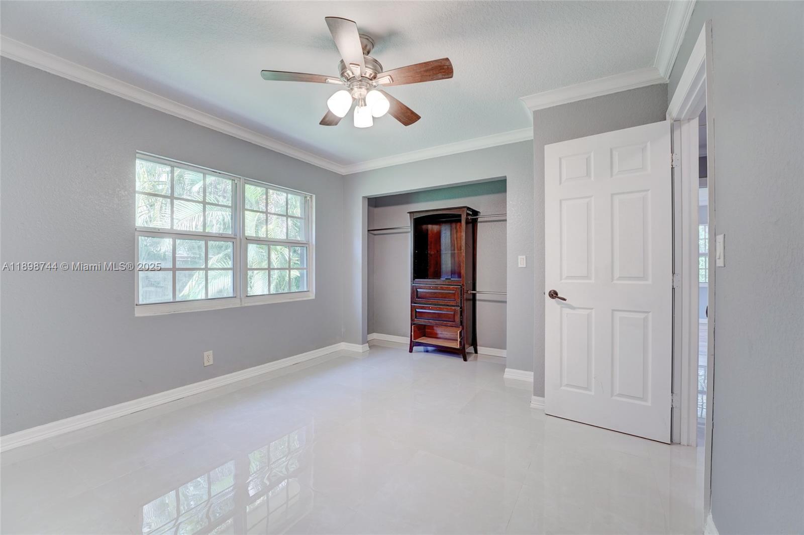 5130 Southwest 208th Lane Southwest Ranches, FL 33332 - Photo 33 of 53 a view of an empty room with a window