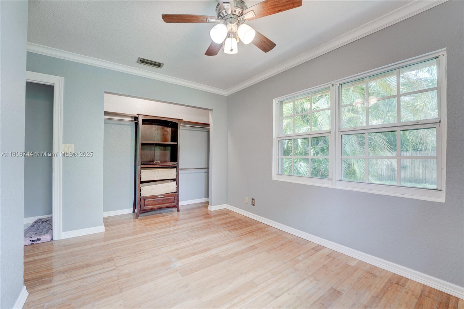 5130 Southwest 208th Lane Southwest Ranches, FL 33332 - Photo 35 of 53 a view of empty room with wooden floor and fan