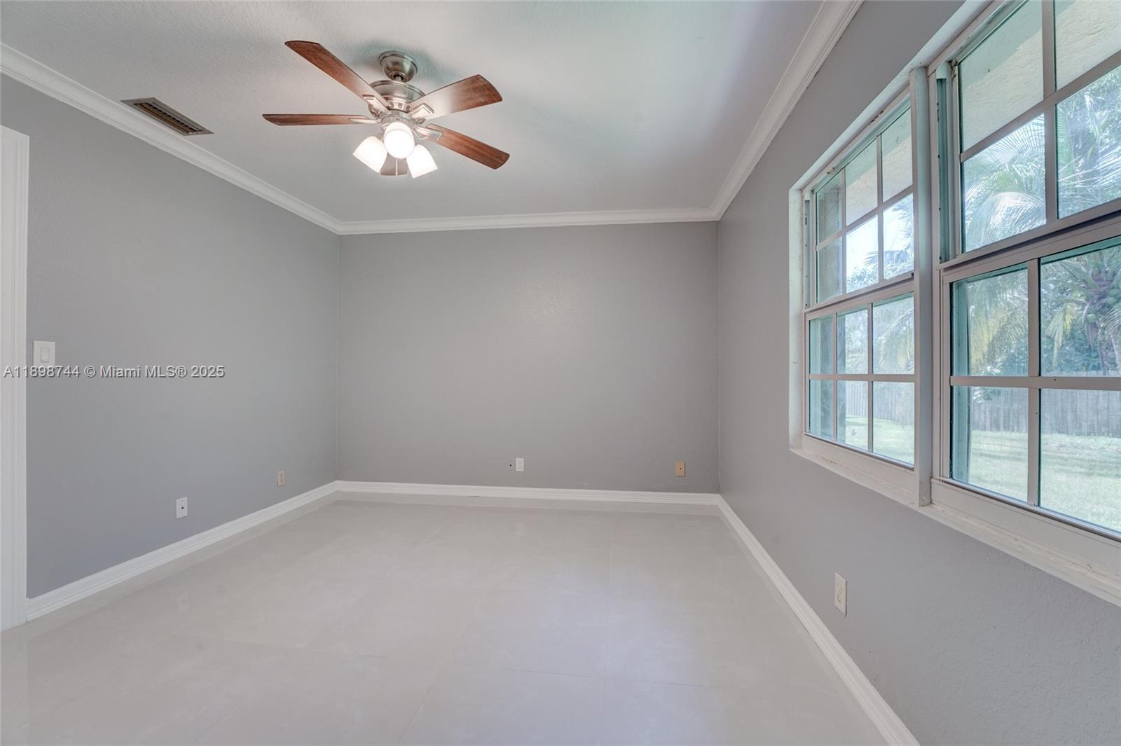 5130 Southwest 208th Lane Southwest Ranches, FL 33332 - Photo 36 of 53 a view of an empty room with a window