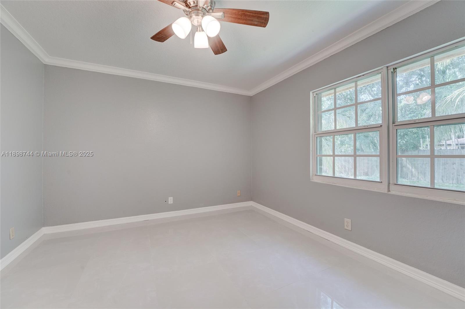 5130 Southwest 208th Lane Southwest Ranches, FL 33332 - Photo 37 of 53 an empty room with a window
