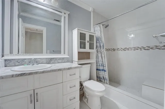 a view of empty room with floor to ceiling window