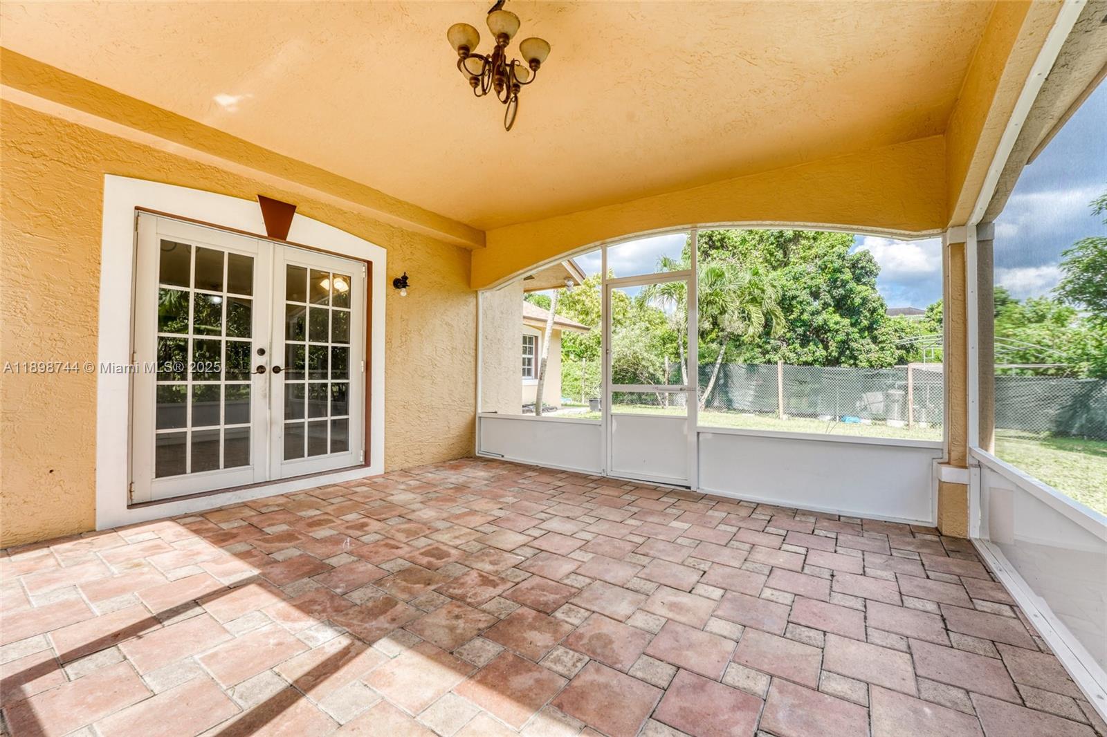 5130 Southwest 208th Lane Southwest Ranches, FL 33332 - Photo 42 of 53 a view of a porch in front of a house with a large window