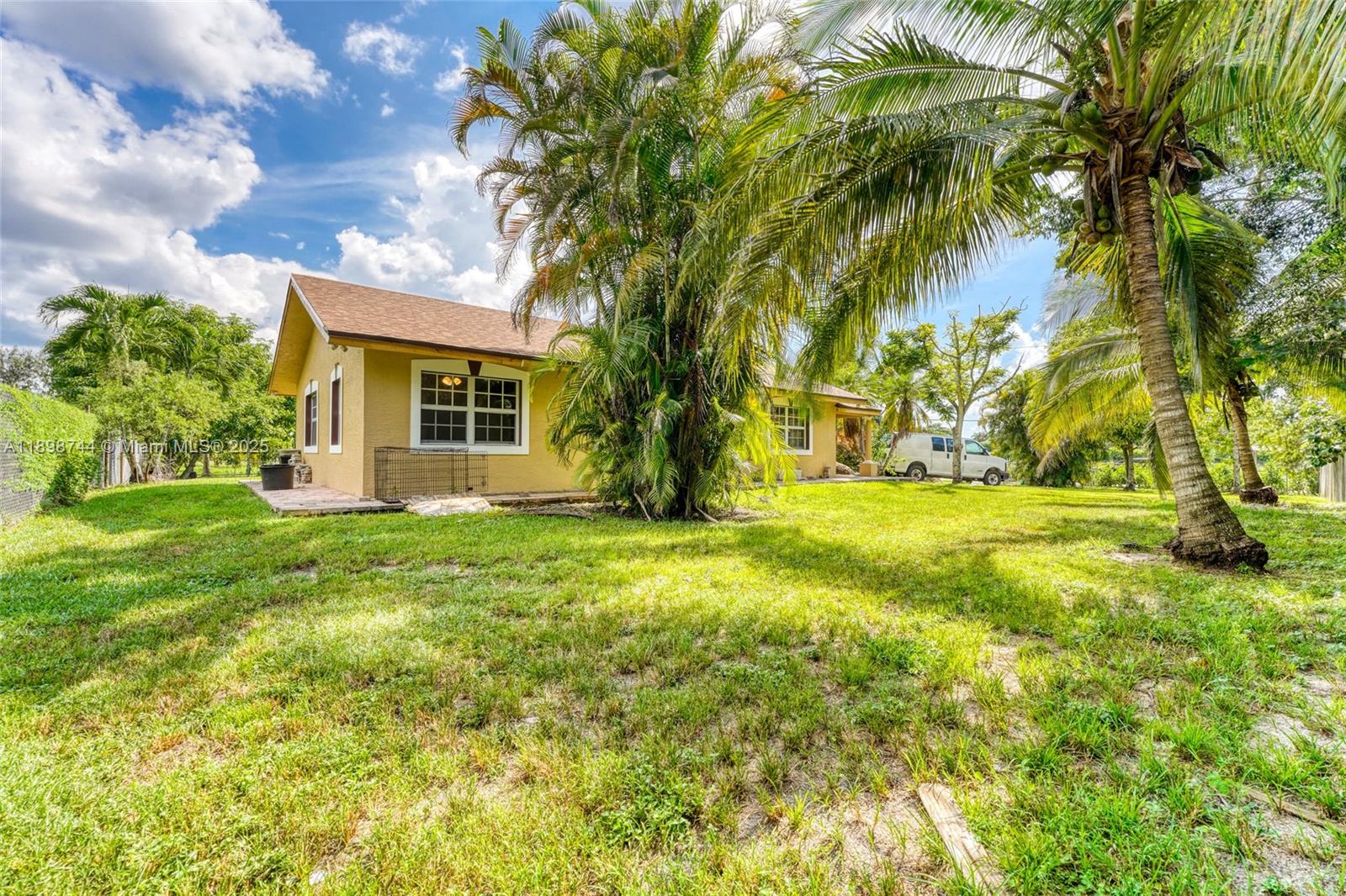 5130 Southwest 208th Lane Southwest Ranches, FL 33332 - Photo 45 of 53 a view of a house with yard and tree s